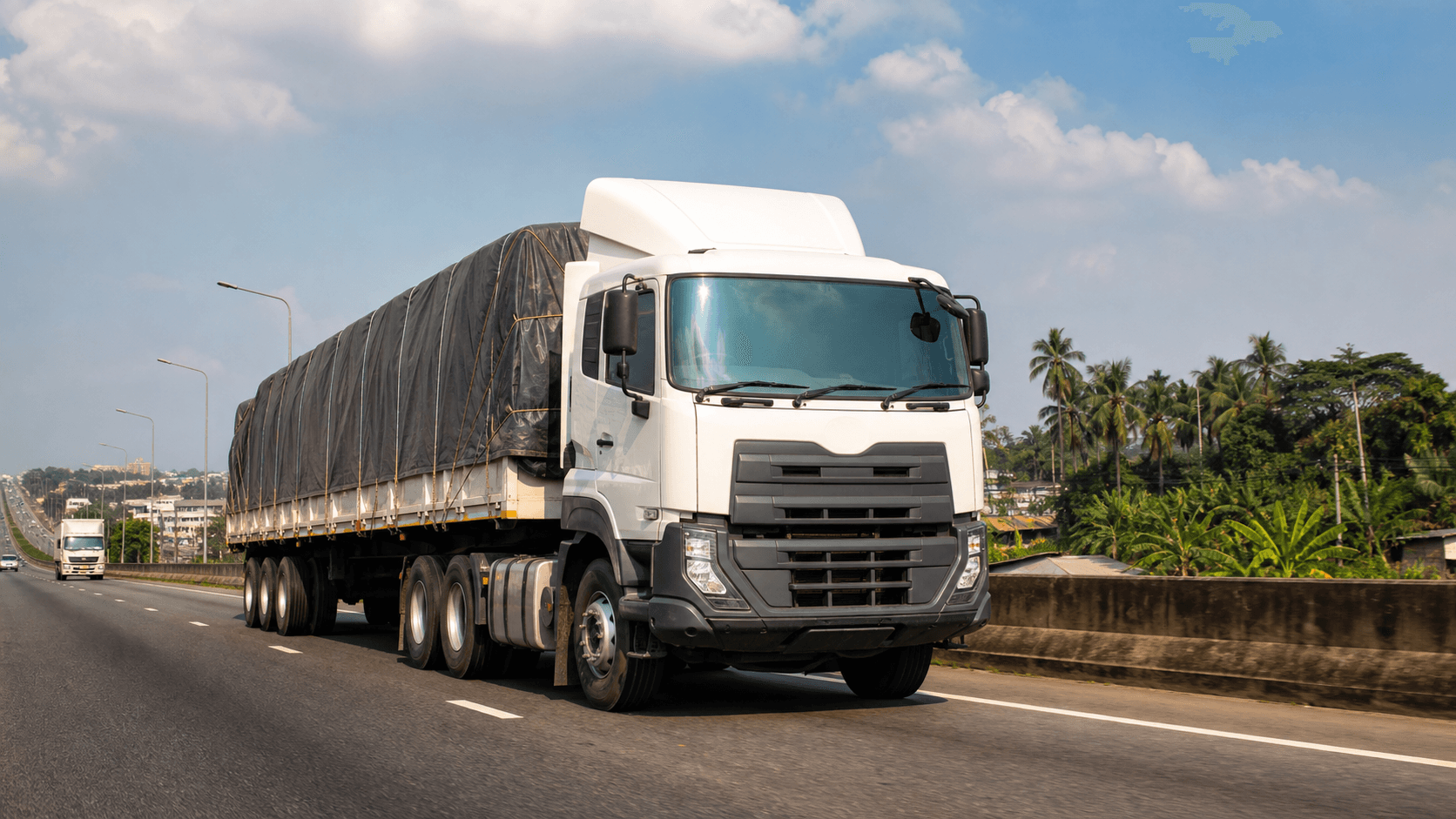 Long-haul cargo truck moving goods on a Nigerian road